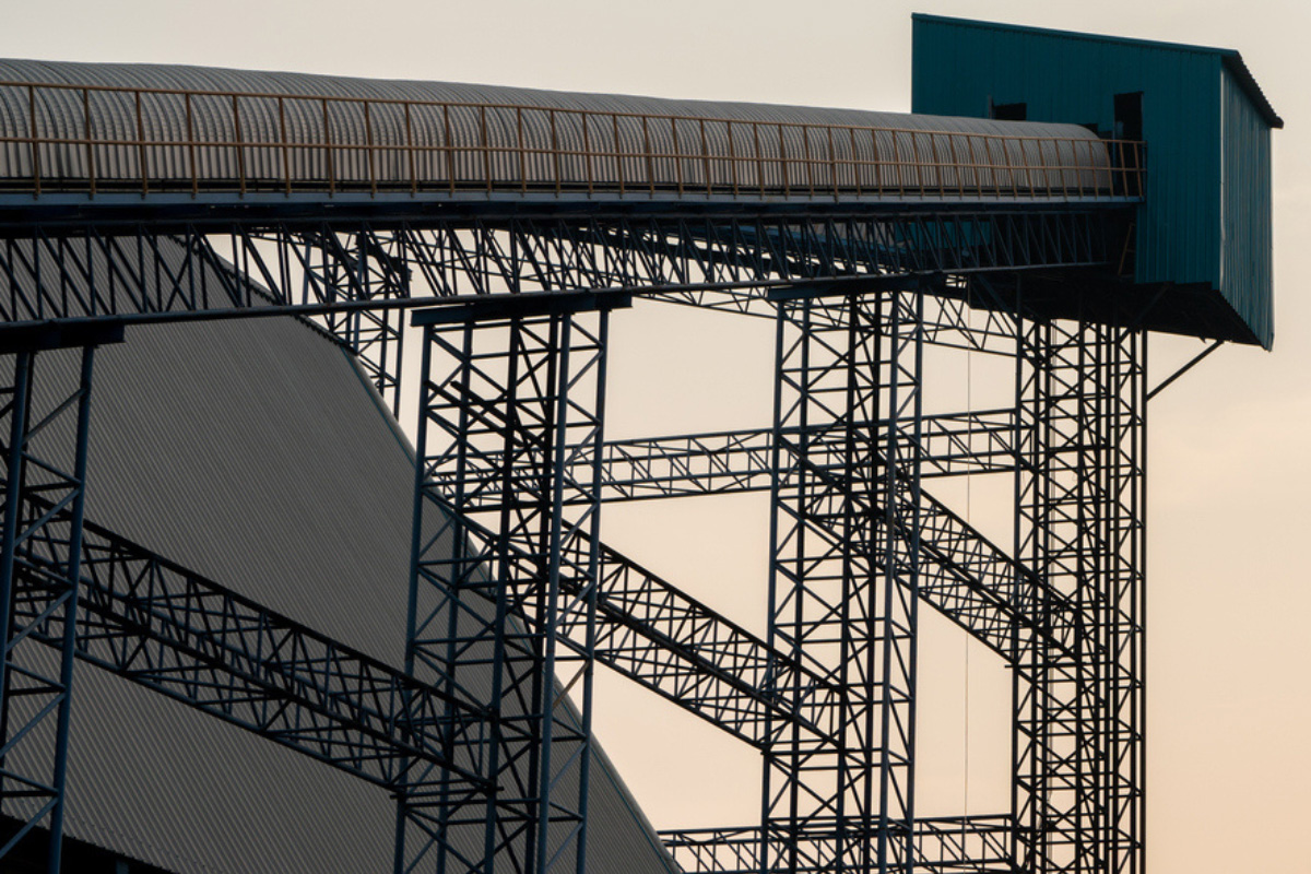 Conveyor system covered with corrugated metal